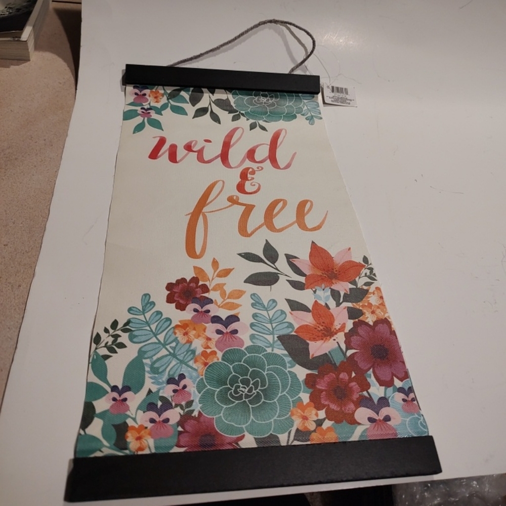 Add a touch of nature to any room with this beautiful hand-painted floral sign.